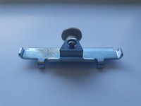 Závěsný jezdec pro posuvné dveřní sítě