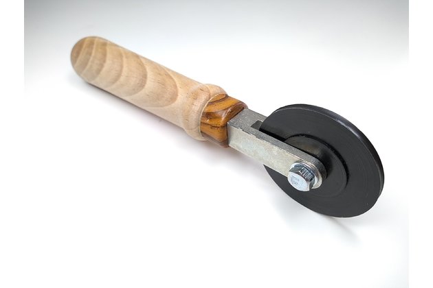 Přítlačné kolečko pro opravu sítě proti hmyzu